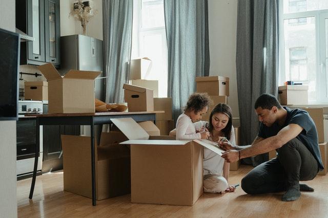 A family packing while organizing a move in Brooklyn.